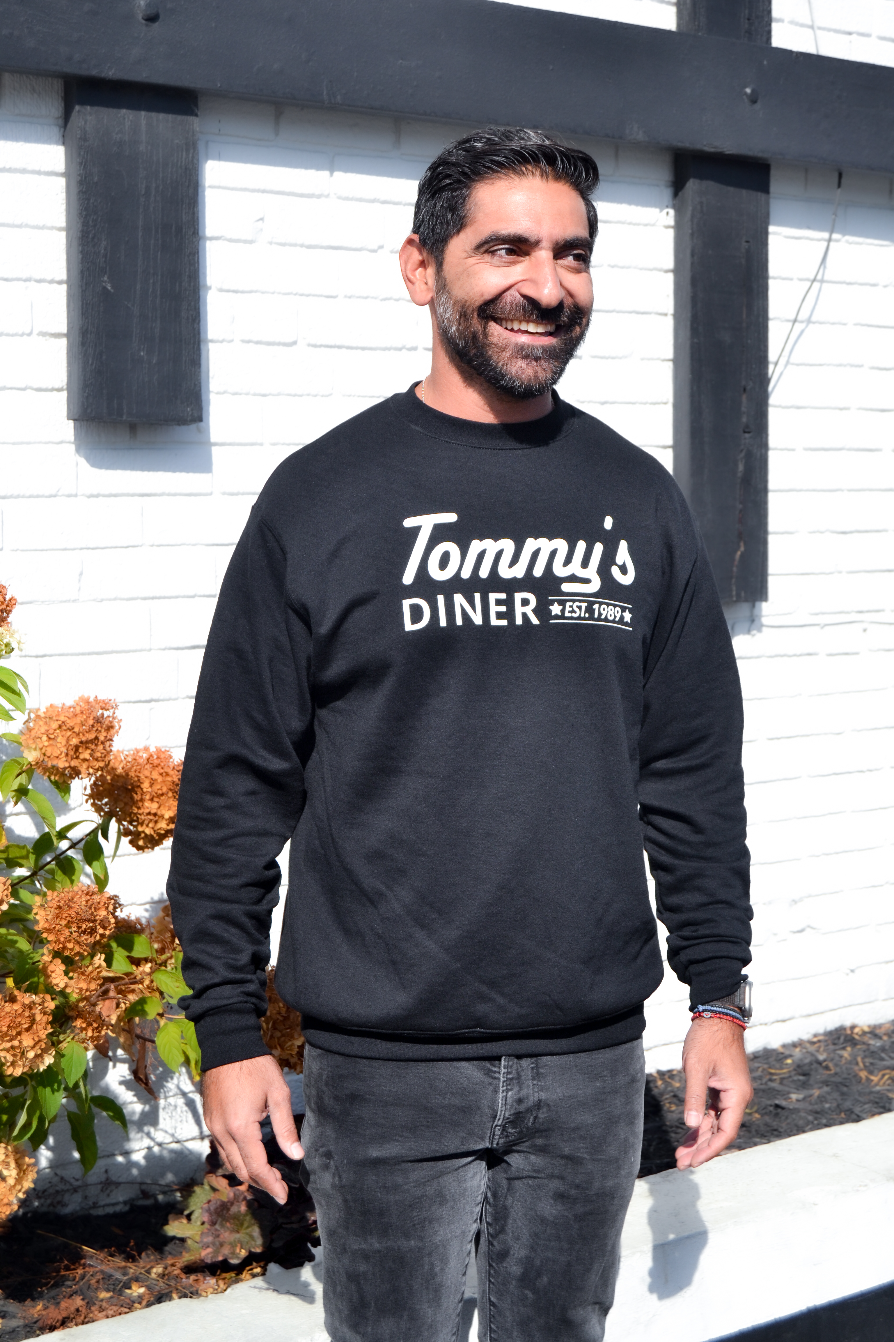 Michael wearing Tommy's Diner sweatshirt